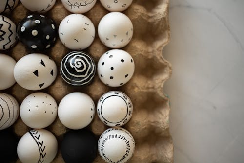 Close-Up Shot of Painted Eggs on Egg Tray