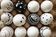 Close-Up Shot of Painted Eggs on Egg Tray