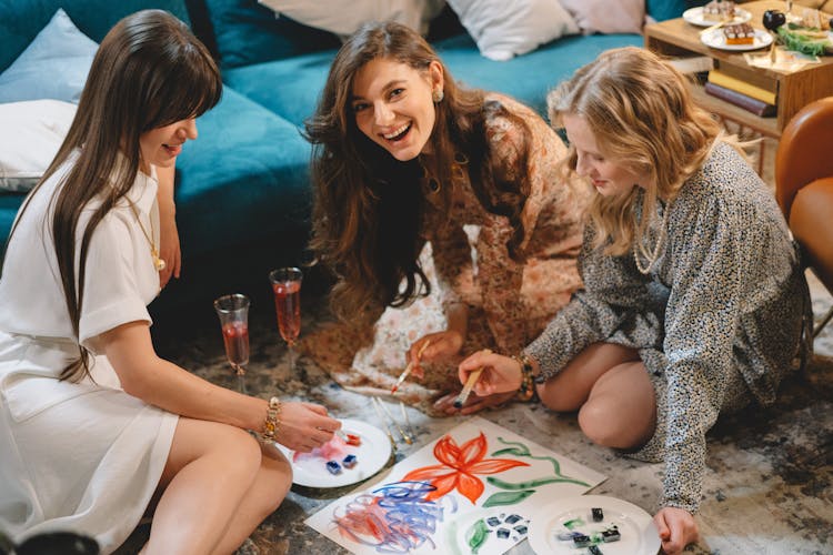 Smiling Women Painting