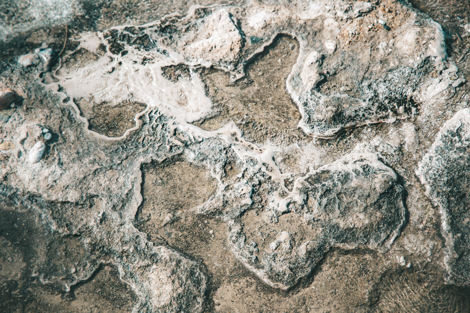 Sediment-damaged heating element showing heavy calcium scale buildup Sediment-damaged heating element showing heavy calcium scale buildup