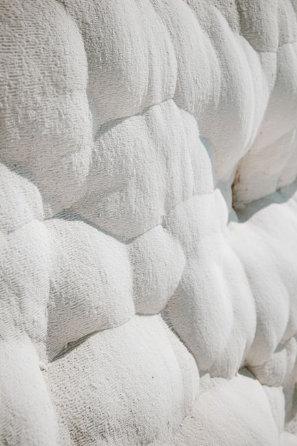 Close-up of a textured white rock formation, ideal for geology and nature themes.