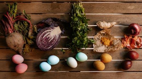 Eggs  and Fresh Vegetables and Herbs on Wooden Table