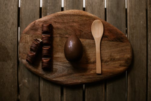 Free Spoon, Chocolate Bars and Egg on Tray Stock Photo