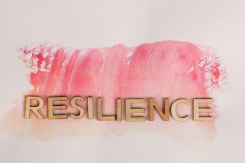 Free Resilience Text on Pink Ink Stock Photo