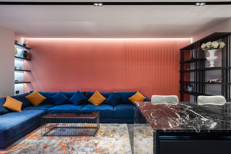 Modern Room Interior With Sofa Against Table In House