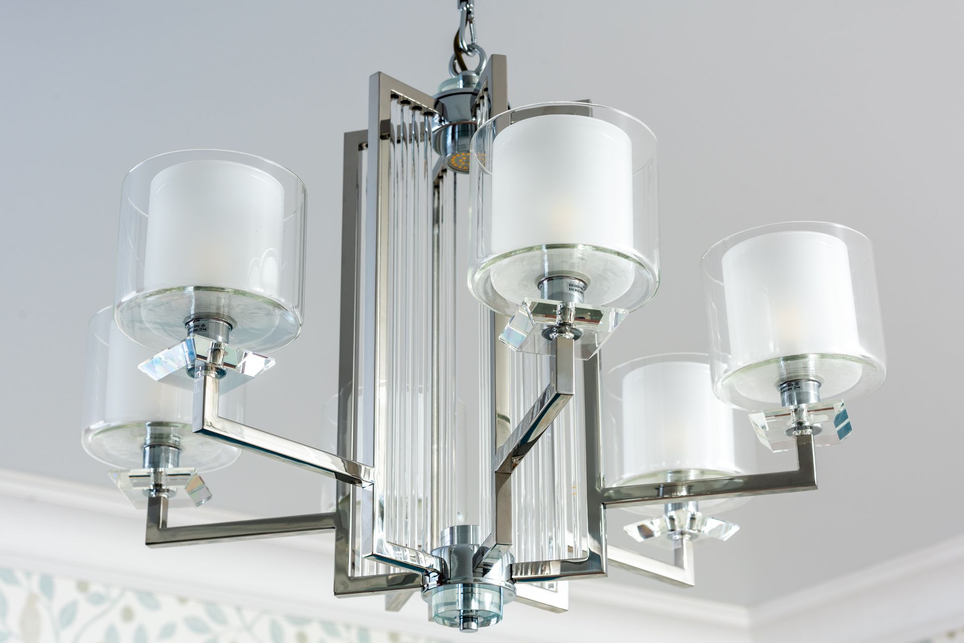 Low angle of creative design of lamp made of glass and metal materials in house room