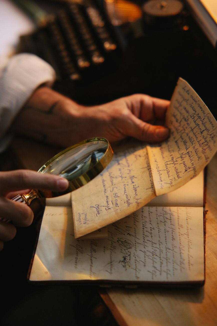 magnifying glass held over printed document text