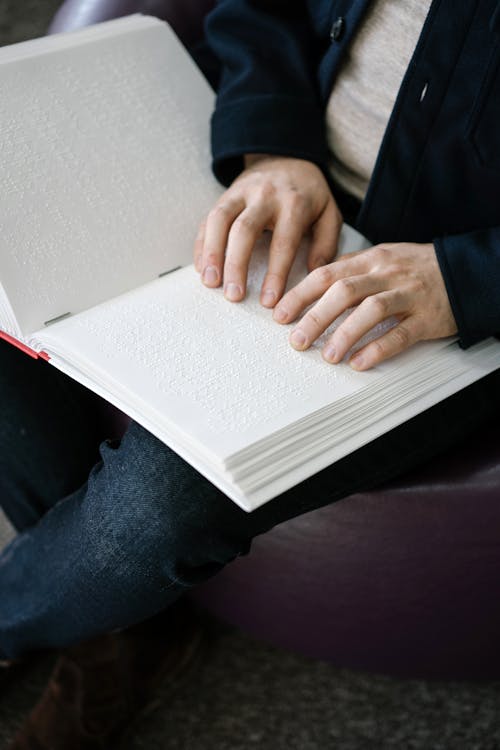 Photo of Person using Braille