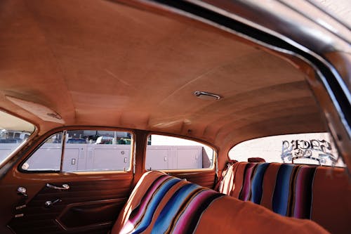 Fotos de stock gratuitas de asiento de coche, coche antiguo, interior del coche