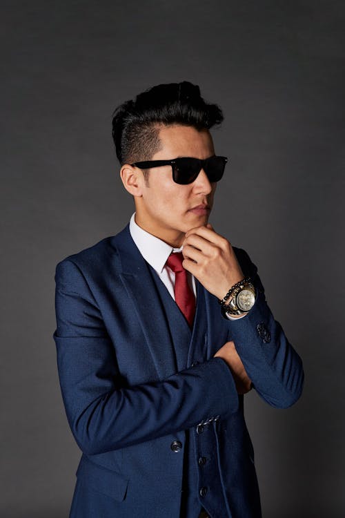 Free Man in Blue Suit Wearing Black Sunglasses Stock Photo