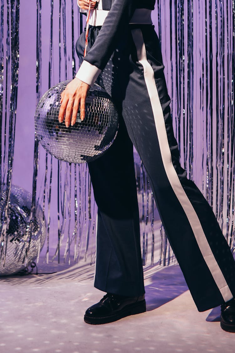 Woman Holding A Disco Ball