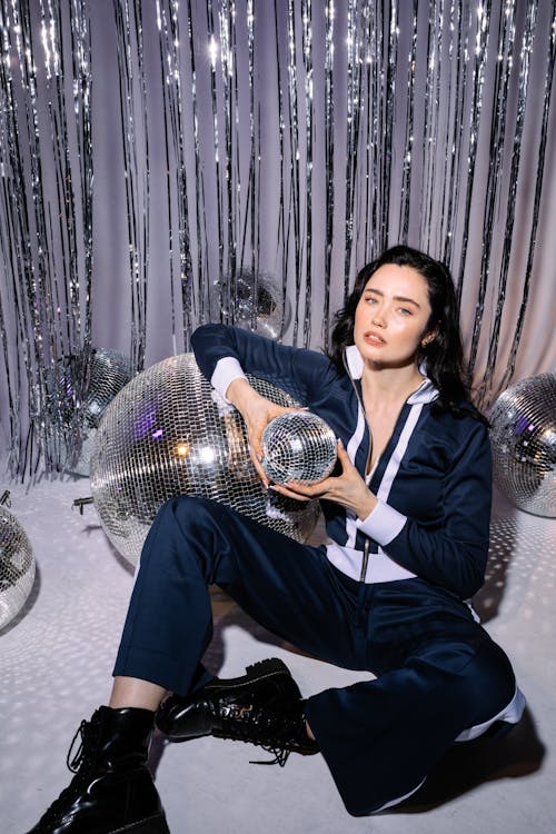 Female Model Posing with the Disco Balls