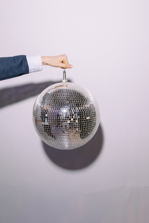 Person Holding a Disco Ball