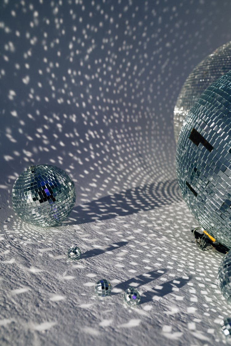 Big And Small Disco Balls Casting Shadows 