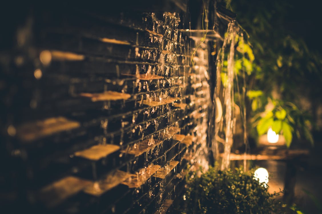 An image of lights around a brick wall
