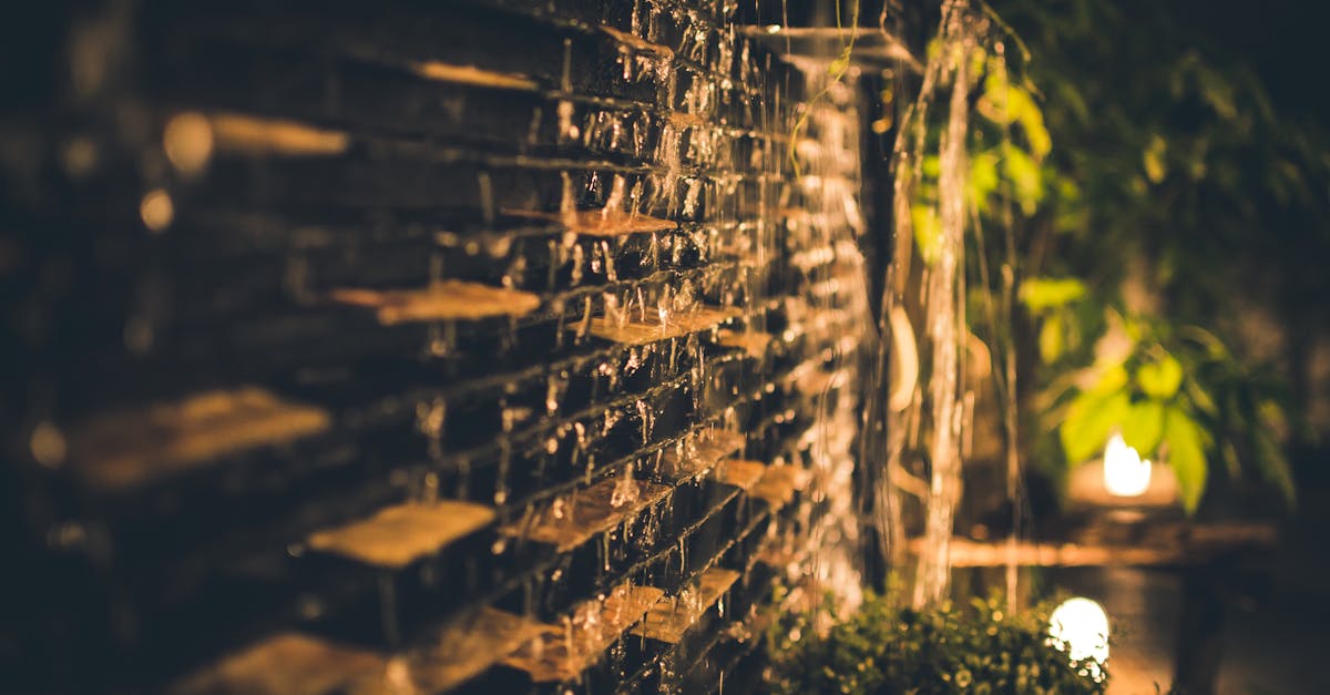 Selective Focus Photography of Brown Brick Wall during Nighttime