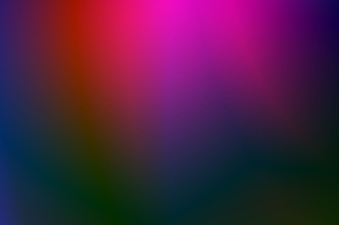 a vivid abstract background featuring a seamless gradient of vibrant c