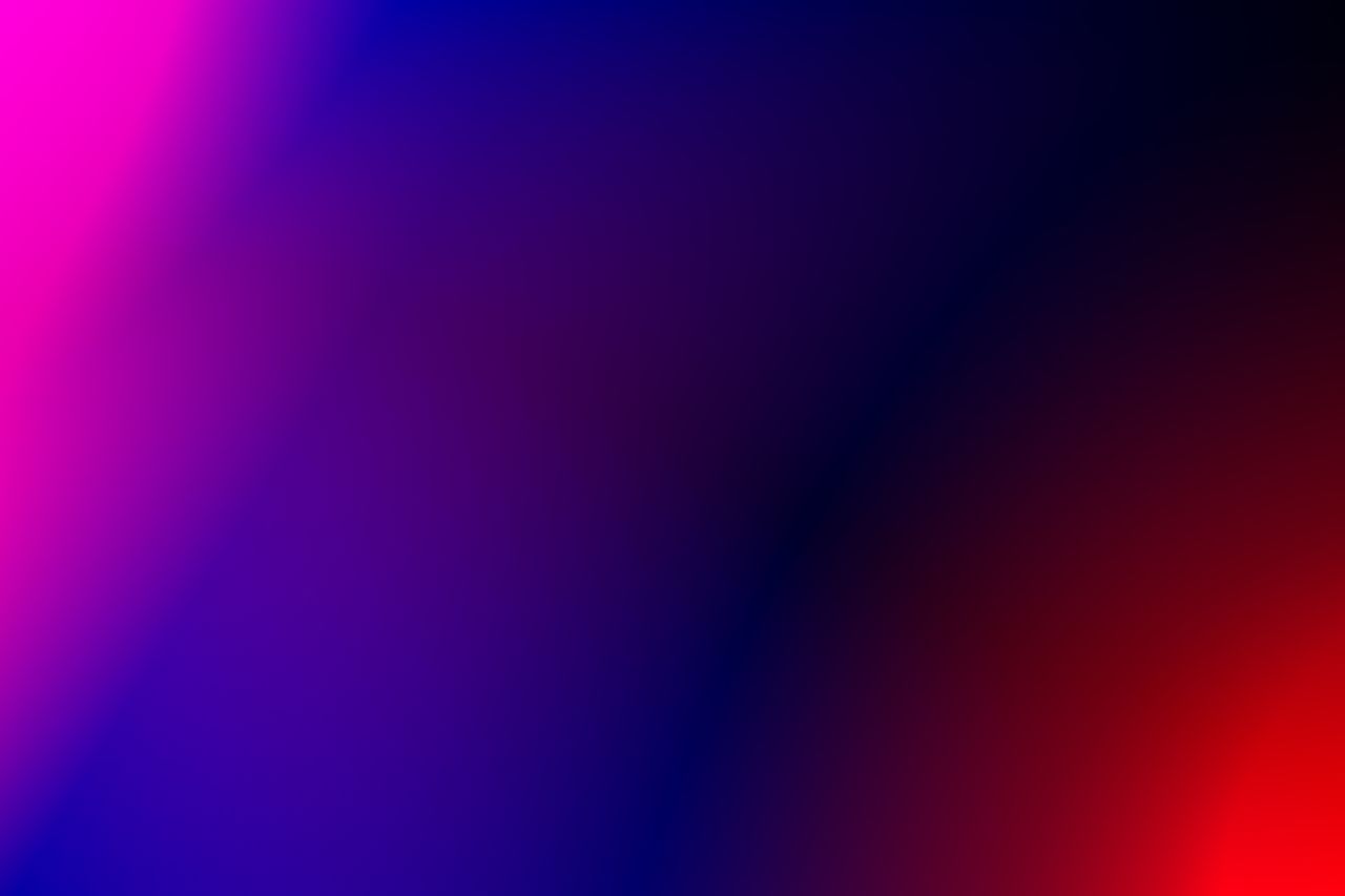 abstract gradient background featuring vibrant pink blue and red hues