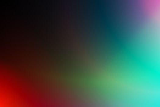 A dynamic blend of vibrant colors creating an abstract gradient background, perfect for design projects.