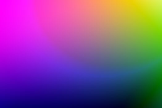 Abstract background with a vibrant color gradient featuring pink, blue, and green hues.