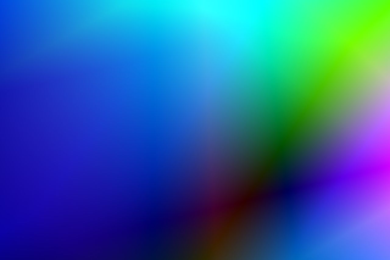 an abstract colorful gradient with vivid hues of blue green and purple