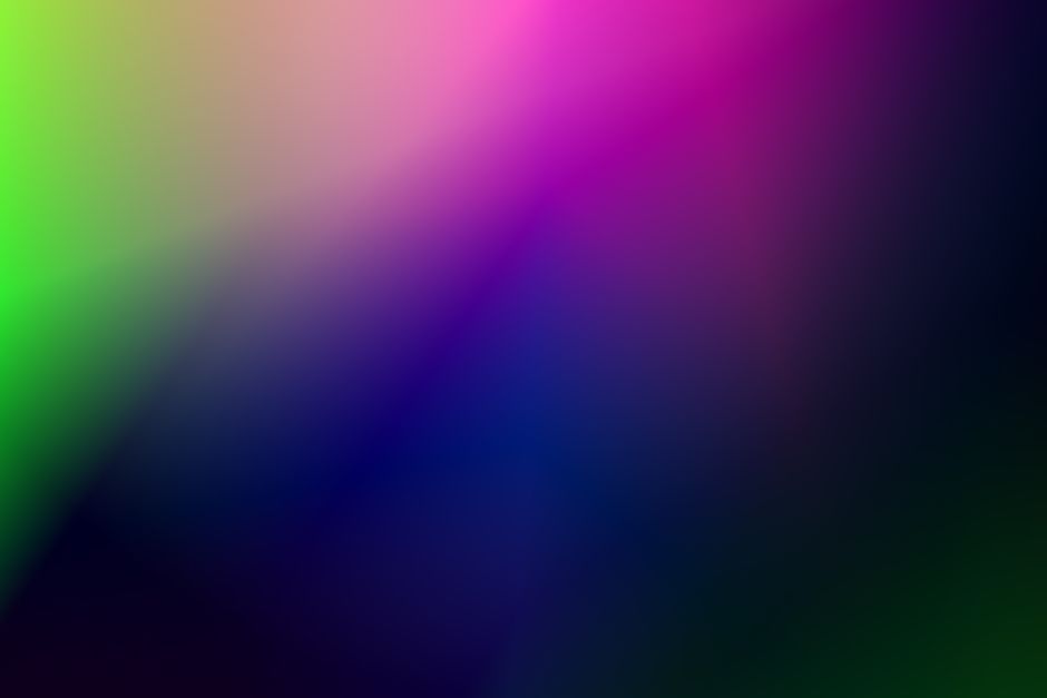 A vivid multicolor gradient background featuring green, pink, and blue tones, ideal for graphic design and digital art.