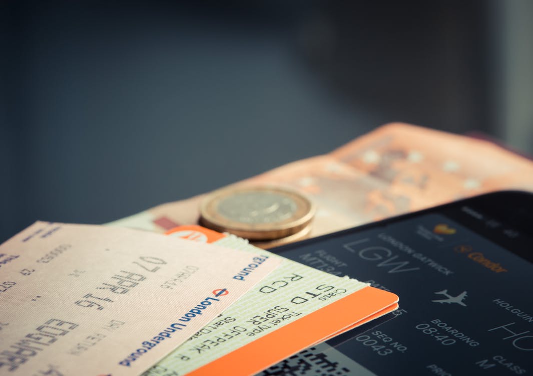 Free Orange and Green Label Airplane Ticket Stock Photo