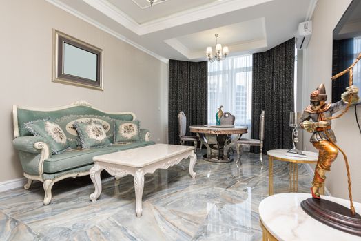 Room interior with classic sofa against tables and statuette of gladiator near wall with television in apartment