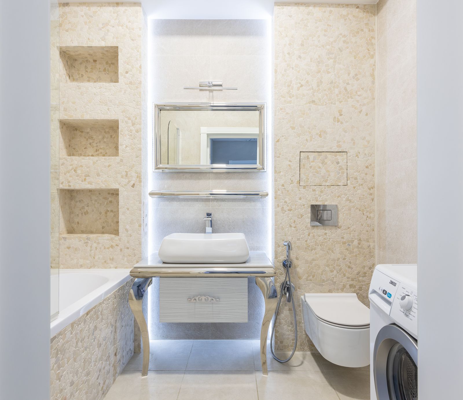 Bathroom and laundry tiling with modern fixtures