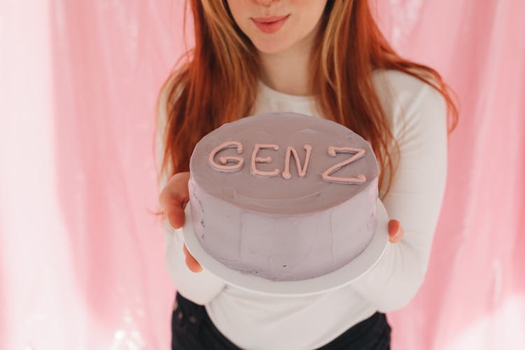 Person Holding A Minimalist Cake