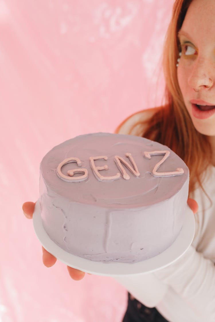 Woman Holding A Minimalist Cake