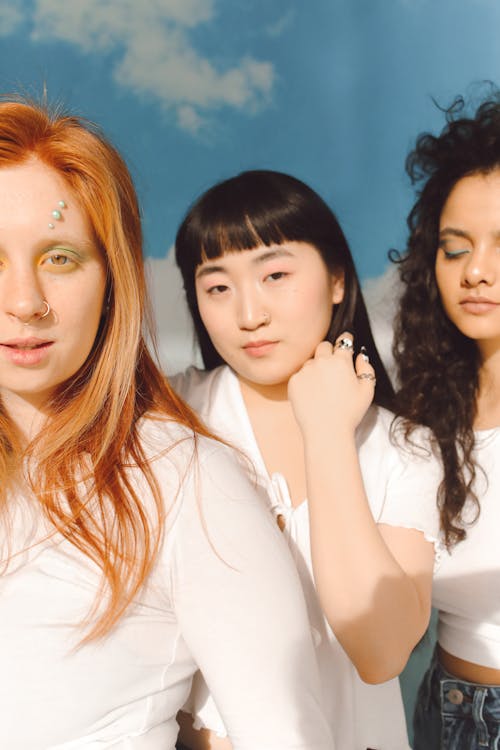 A Group of Girls in White Tops