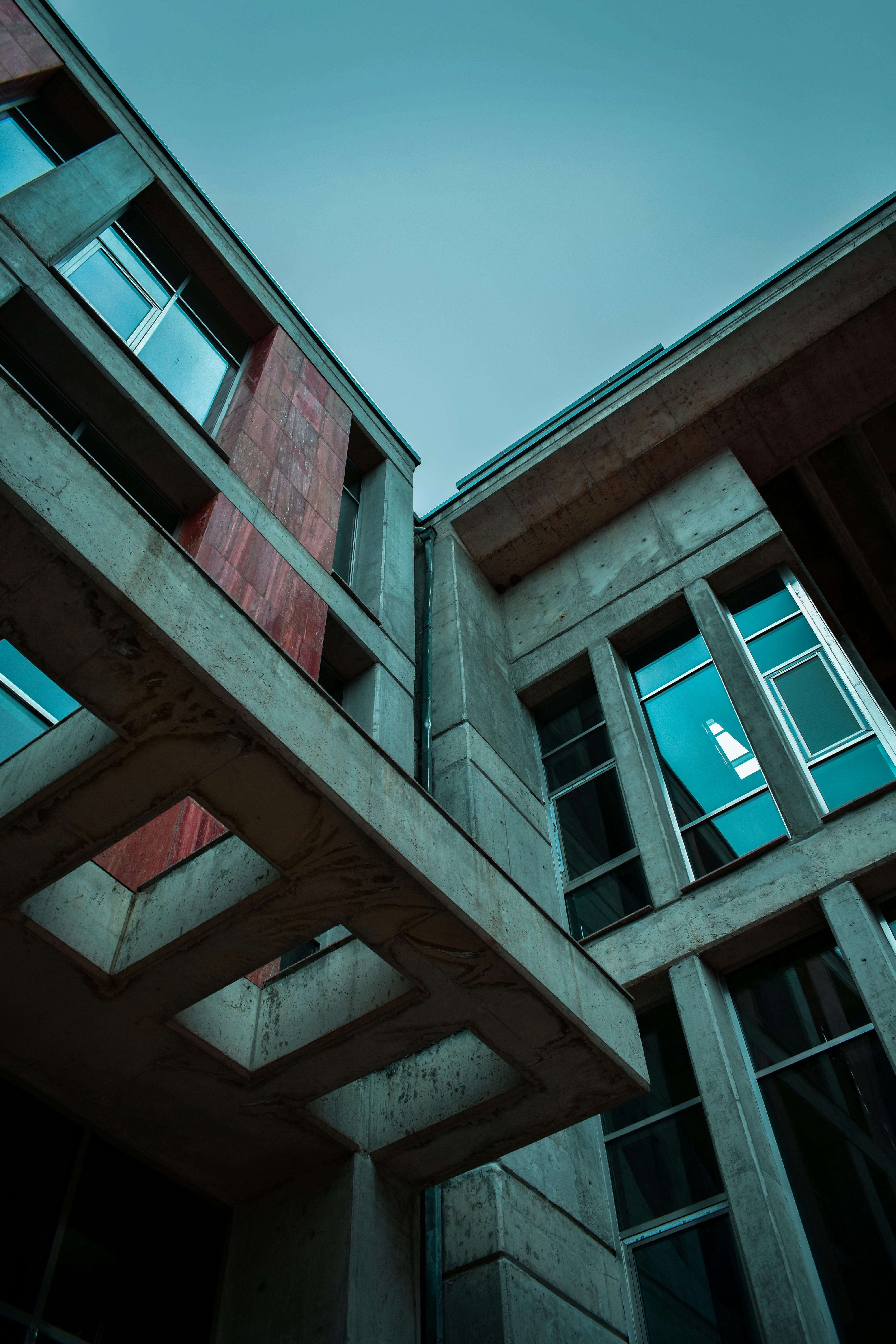 Dramatic low angle shot of modern concrete and glass architecture in Edirne, Turkey.