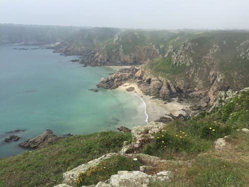 Fotos de stock gratuitas de escénico, la costa, tierra costera