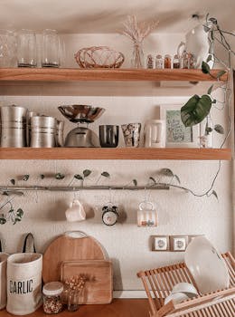 Stylish kitchen shelves featuring rustic décor and cooking essentials in warm tones.