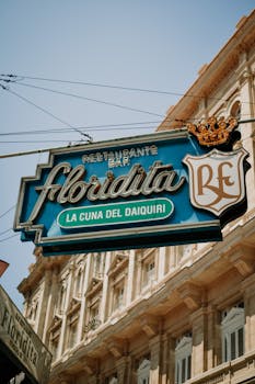 Famous Floridita bar sign in Havana, Cuba, known for its connection to Hemingway and daiquiris.