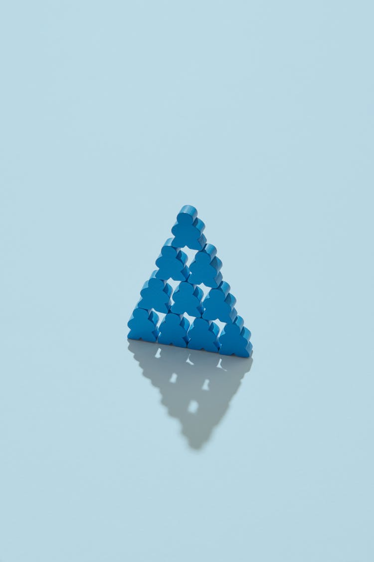 Blue Triangle Formed Of Pawns