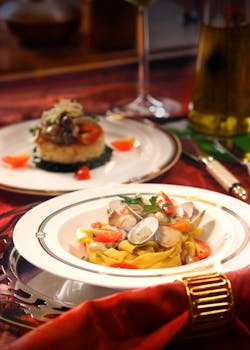 Elegant seafood pasta served on a stylish table setting, perfect for gourmet dining.