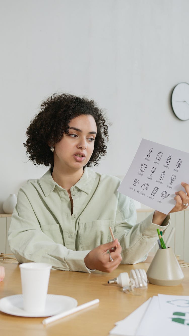 Teacher Holding A Paper