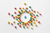 Single Blue Pawn among Colorful Pawns