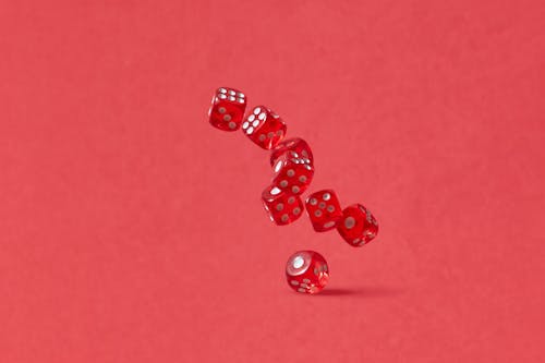
Red Dice in the Air