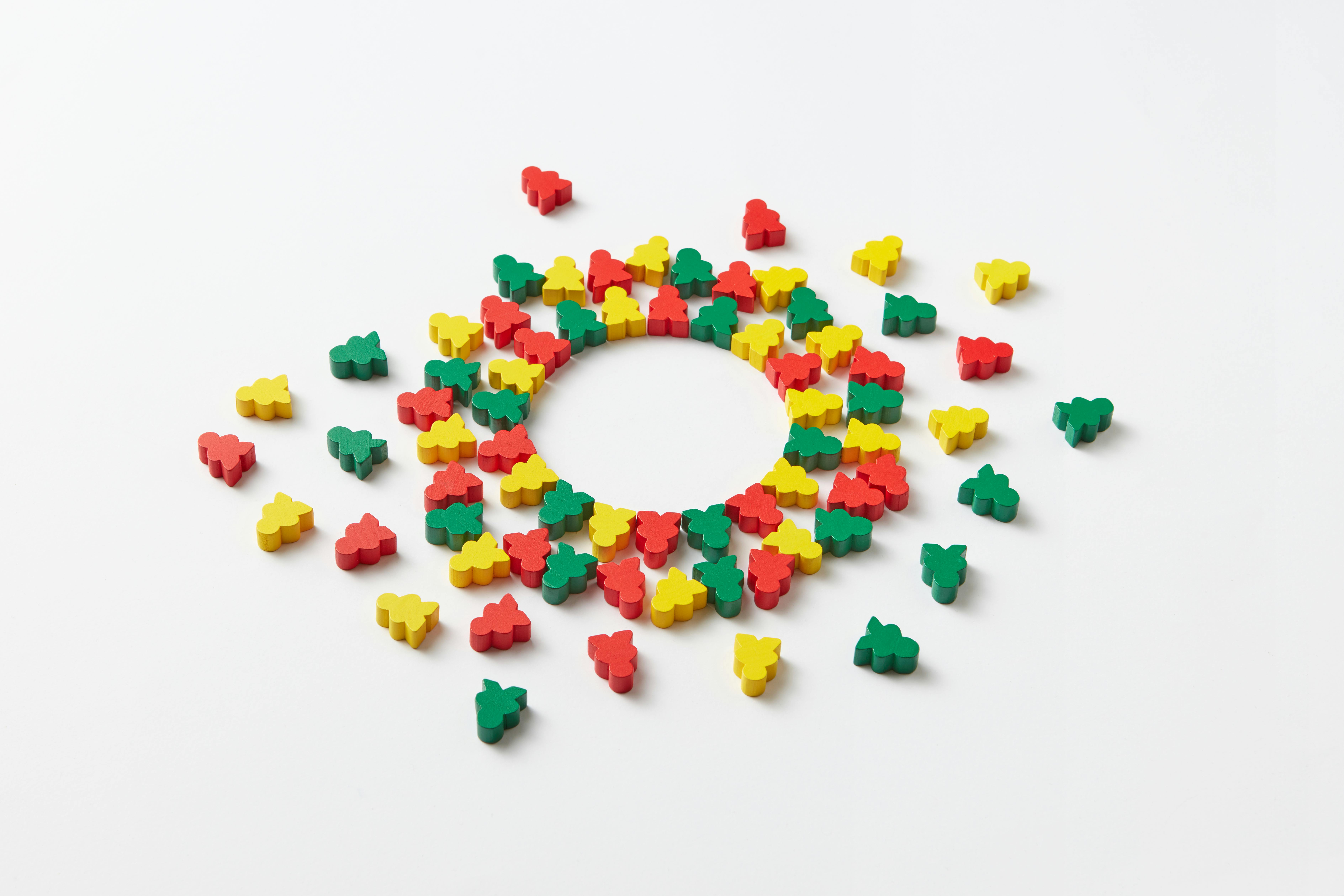 A Bunch of Colorful Wooden Blocks Men Scattered · Free Stock Photo