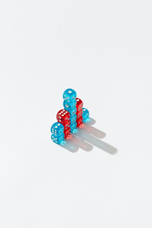 Red and Blue Dice Stack on Top of Each Other 