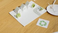 Paper Model of Neighborhood by Recycling Symbol on Table