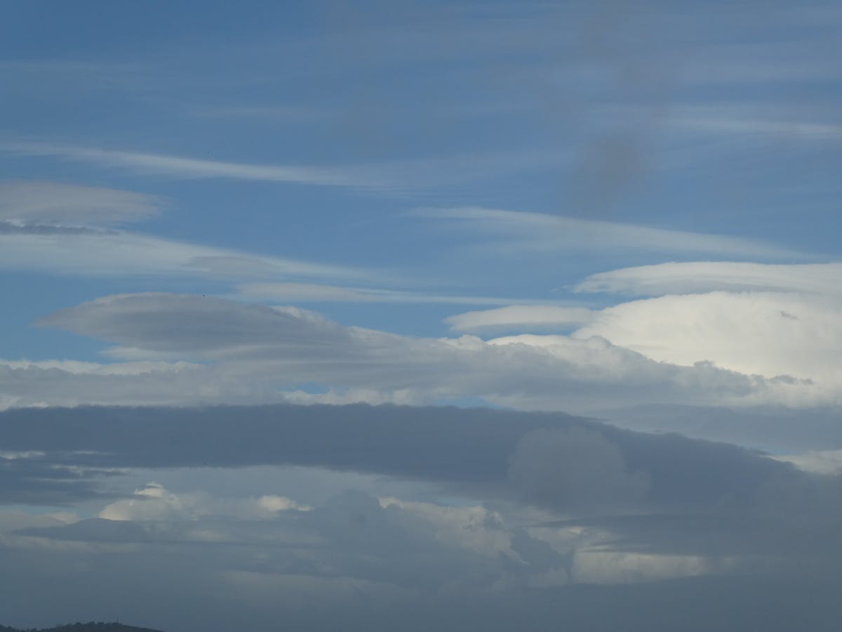 Disassembled laptop with visible modular components and tools