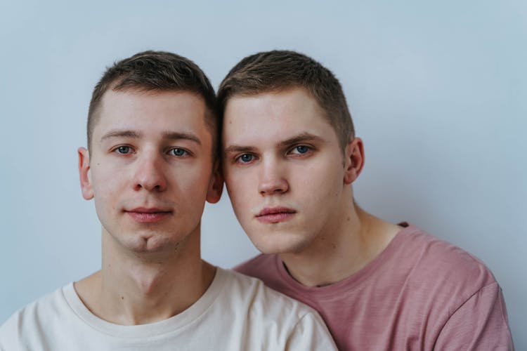 A Young Couple With Their Heads Close Together