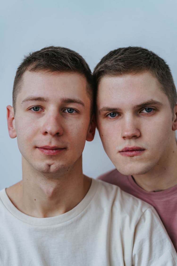 A Young Couple With Their Heads Close Together