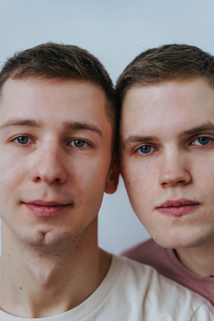 A Young Couple With Their Heads Close Together