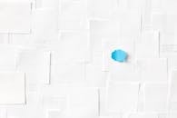 A Blue Cloud Speech Bubble on a White Paper