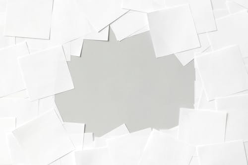 Overhead Shot of Blank White Paper Sheets